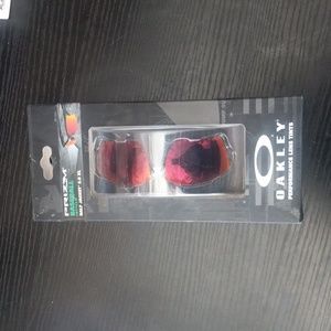 Oakley prizm lens tinted replacement. Never been opened in original box.